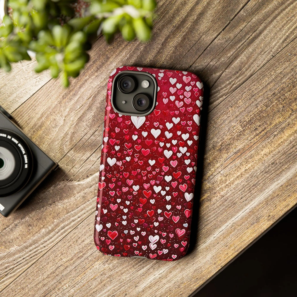 Phone Case with a pattern of red, white and pink hearts